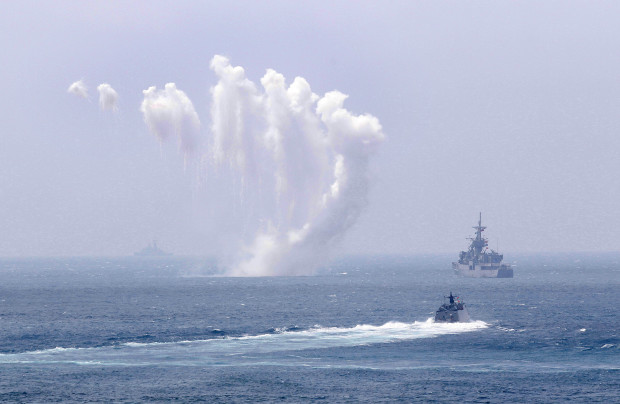 Taiwan Navy's Knox-class frigate fires chaff during the annual Han Kuang exercises on the outlying Penghu Island, Taiwan, Thursday, May 25, 2017. (AP Photo/Chiang Ying-ying)