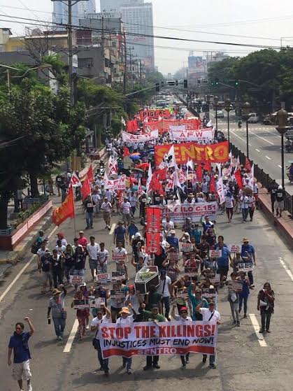 Workers' groups march on the streets of Manila, calling for higher wages and an end to contractualization on Labor Day, May 1, 2017. (Photo from the Sentro ng Nagkakaisa at Progresibong Manggagawa.)