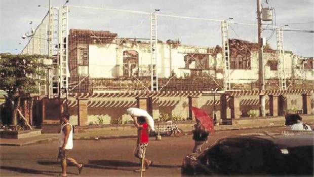The fight to preserve the house in Biñan City where Rizal’s mother, Teodora Alonso, once lived has reached a court which was  asked to issue an expropriation order to save the historic property (left) from construction work (above) that would turn it into another branch of Jollibee, a popular fast-food chain. —JOHN TUGANO AND CHOLO LEGASPI/CONTRIBUTORS