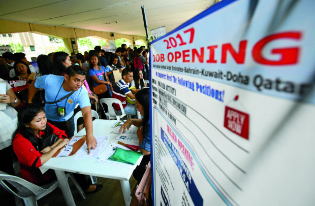 Job seekers gather at Quezon City Hall grounds during the Lador Day Job and Business Fair. INQUIRER PHOTO / NINO JESUS ORBETA