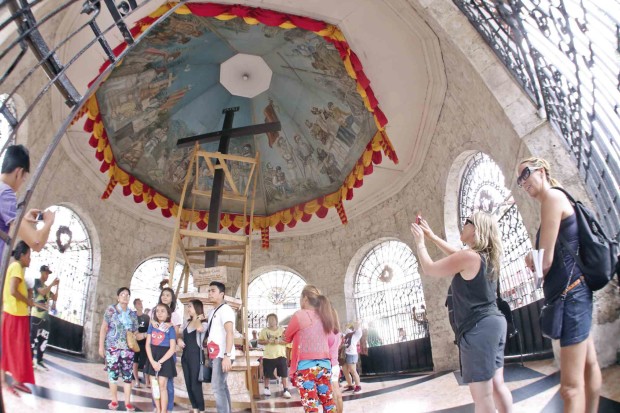 The Magellan’s Cross is among the top attractions in Cebu City in Central Visayas. Resort and hotel operators in the provinces of Cebu and Bohol are preparing for a business slowdown following the outbreak of violence in Marawi City and the declaration of martial law in Mindanao.  —JUNJIE MENDOZA/CEBU DAILY NEWS