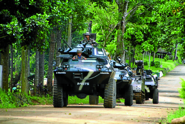 Troop movement in armored tanks moving out of 103rd Army's Brigade  Kampo ranao in Marawi City to provide fore power support of the ongoing firefight between the military and the suspected ISIS and Maute group.  Richel V. Umel, Inquirer Mindanao