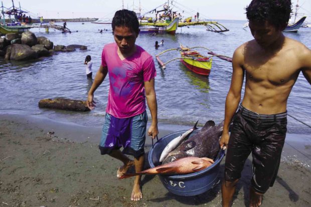 Fishermen in Infanta town in Pangasinan province depend on the rich fishing ground near the disputed Panatag Shoal in the West Philippine Sea for their livelihood. —WILLIE LOMIBAO