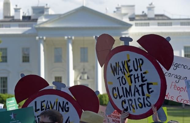Climate change - protesters vs Donald Trump - White House - 1 June 2017