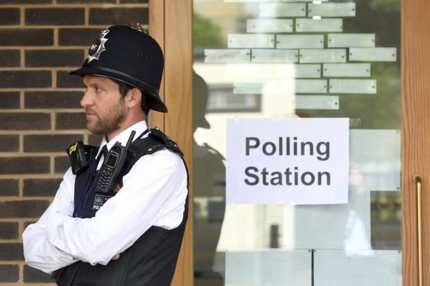 Cop outside UK polling place - 8 June 2017
