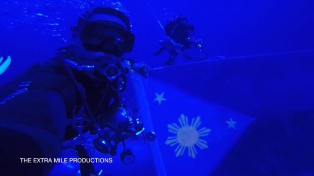 Philippine flag underwater on Philippine Rise