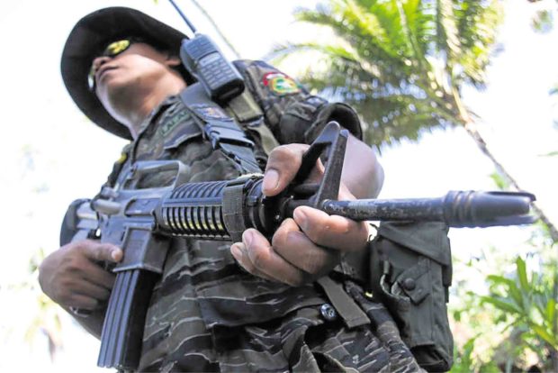 Taking part in President Duterte’s war on drugs will be the new role for members of Moro Islamic Liberation Front (MILF), like this rebel in an MILF camp in Maguindanao. —JEOFFREY MAITEM