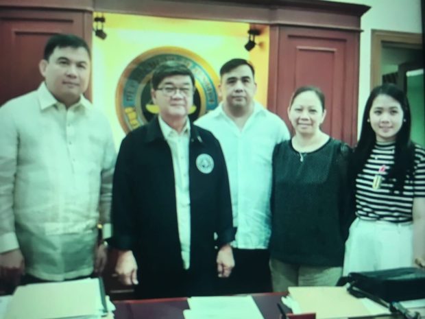 The family of slain University of Santo Tomas (UST) Horacio Castillo III with Justice Secretary Vitaliano Aguirre II. DOJ PHOTO