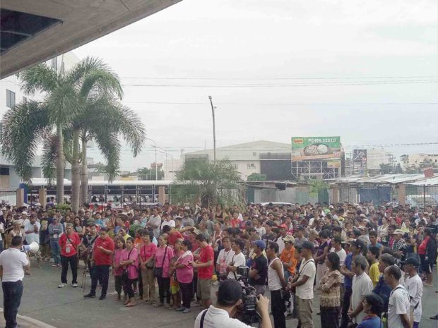 Farmers gather in Naga City in preparation for a journey to Manila for a series of protest rallies. —CONTRIBUTED PHOTO