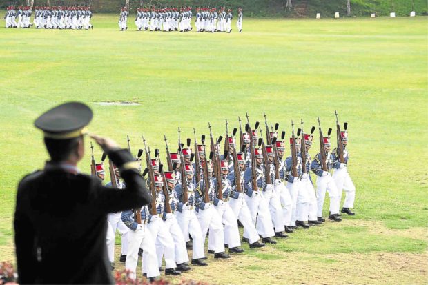 AFP chief of staff Gen. Eduardo Año salutes PMA cadets who gave him a testimonial parade on Saturday. —EV ESPIRITU