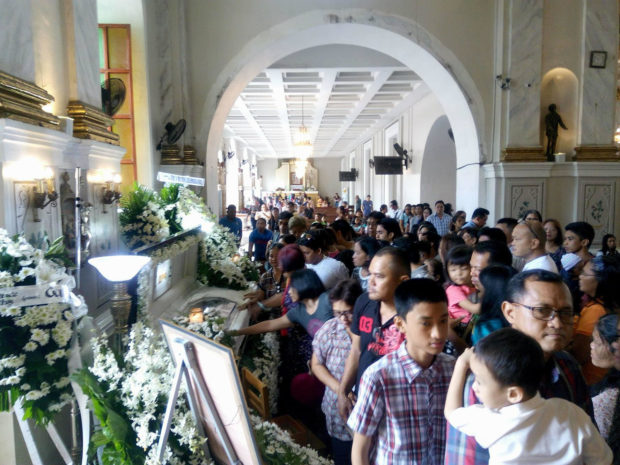 Parishioners continue to line up to pay their last respects to the late Butuan Bishop Juan de Dios Pueblos inside the St. Joseph the Worker Cathedral Parish in Tagbilaran City, Bohol, on Sunday morning before his remains will be transported to Butuan City on Sunday evening. Leo Udtohan/Inquirer Visayas