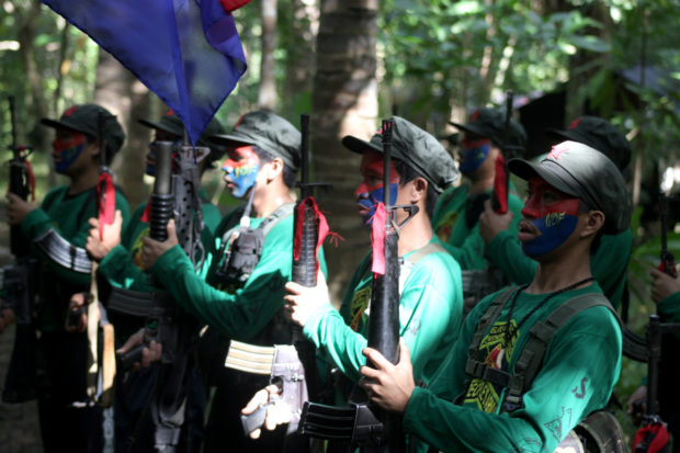 REBEL THREAT Members of the communist New People’s Army (NPA) train in their Sierra Madre stronghold. President Duterte has said he would classify theNPA as a terrorist group. —INQUIRER PHOTO
