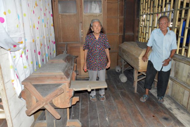 The Tapic couple, Luciano, 85, and Flora, 82, residents of Barangay Kiwalan, Iligan City, prepared their caskets years ago so that their children will not be bothered to look for caskets for them when they will die, they said. (Divina M. Suson)