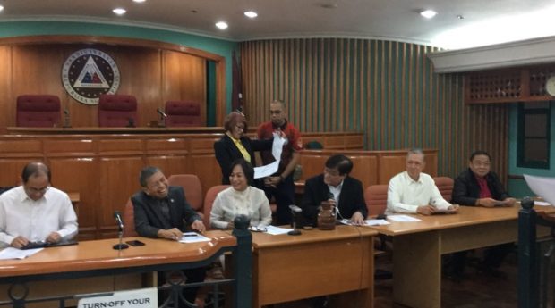 Aquino case goes to Sandigan 3rd division chaired by Presiding Justice Amparo Tang (seated, in white). Photo by Nikko Dizon