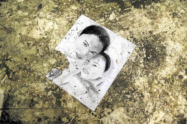 A house occupied by now dead Southeast Asia Islamic State emir Isnilon Hapilon yields a portrait of a couple who were presumed to be the home owners. —JEOFFREY MAITEM