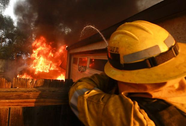 LA County firefighter at burning house - 5 Dec 2017