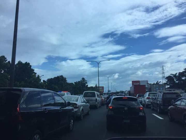 Motorists were stuck in heavy traffic after a trailer truck and a pick-up truck figured into an accident at Southbound lane of the South Luzon Expressway (SLEX). Photo by Ju Li, Contributor