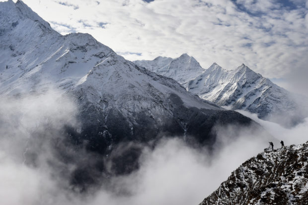 Snowstorm kills 9 climbers on Nepal peak