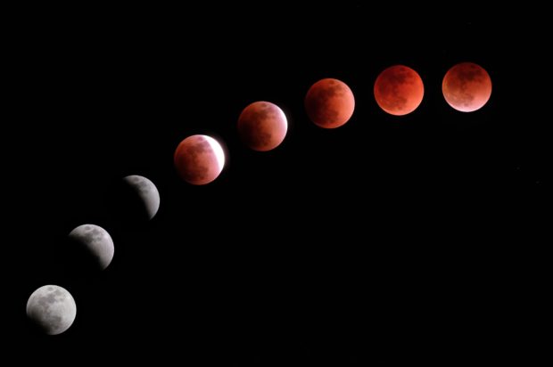 Composite image of Lunar eclipse over Tokyo —AFP