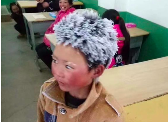 China's 'Ice Boy' now walks only 10 minutes to school from his new home