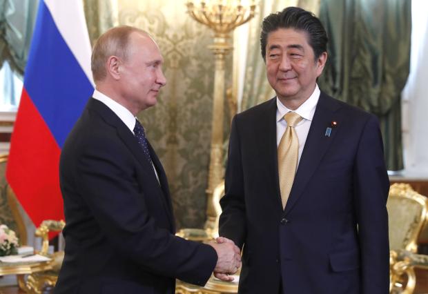 Vladimir Putin and Shinzo Abe
