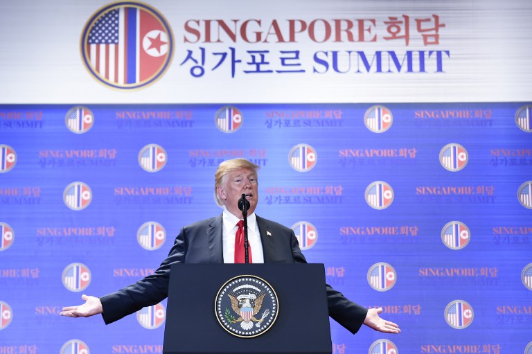 US President Donald Trump speaks at a press conference following the historic US-North Korea summit in Singapore on June 12, 2018. Trump and North Korean leader Kim Jong Un hailed their historic summit on June 12 as a breakthrough in relations between Cold War foes, but the agreement they produced was short on details about the key issue of Pyongyang's nuclear weapons. / AFP PHOTO / SAUL LOEB