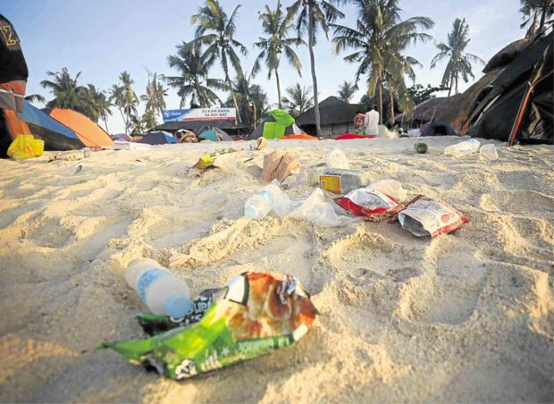 Cebu town's public beach reopens after 11 months.