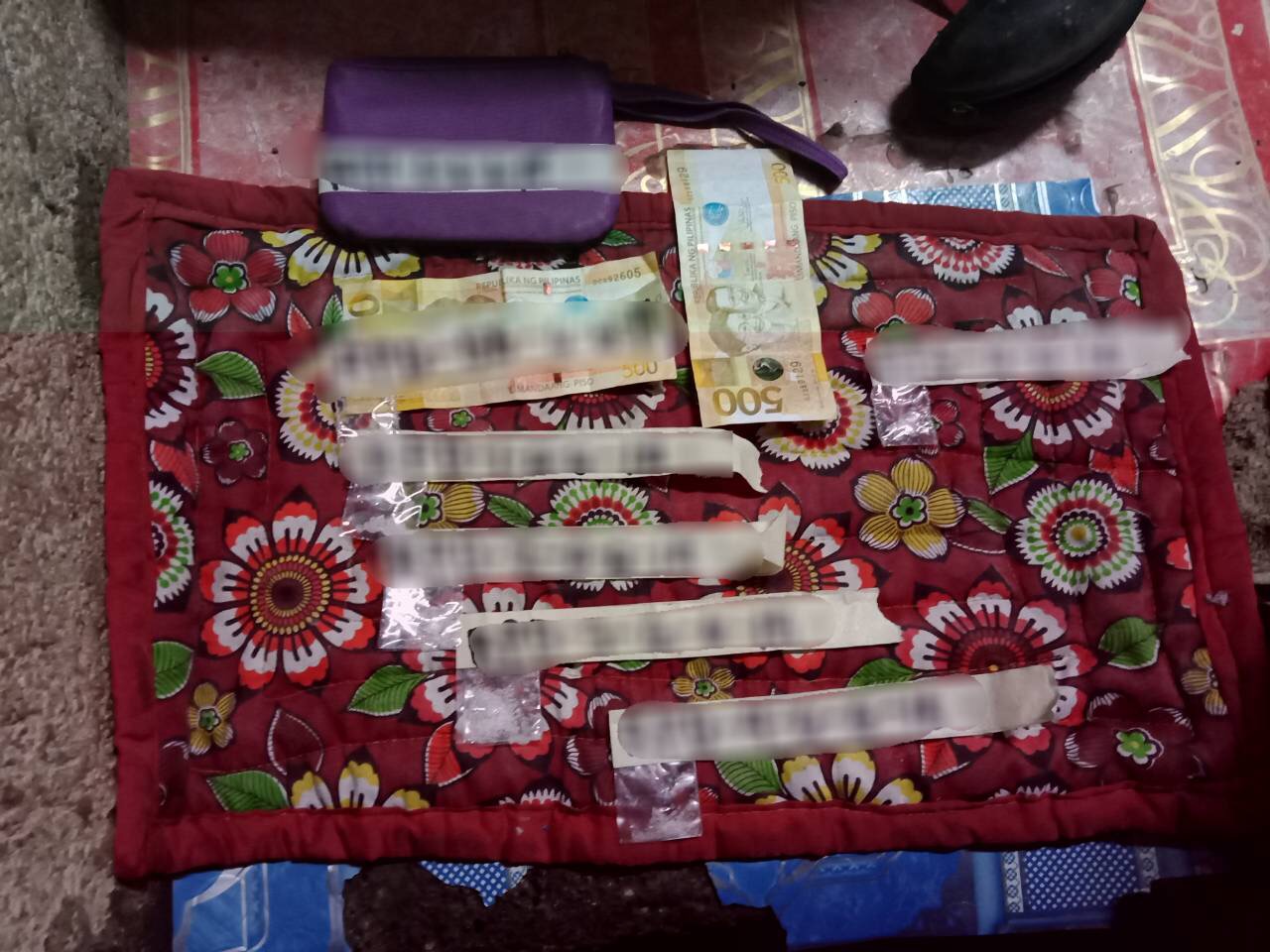 Substances and cash confiscated from the suspects. Photo from Marikina police