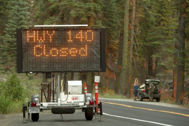 Highway 140 closure sign