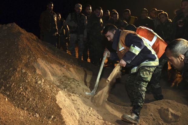 IS mass grave in Syria