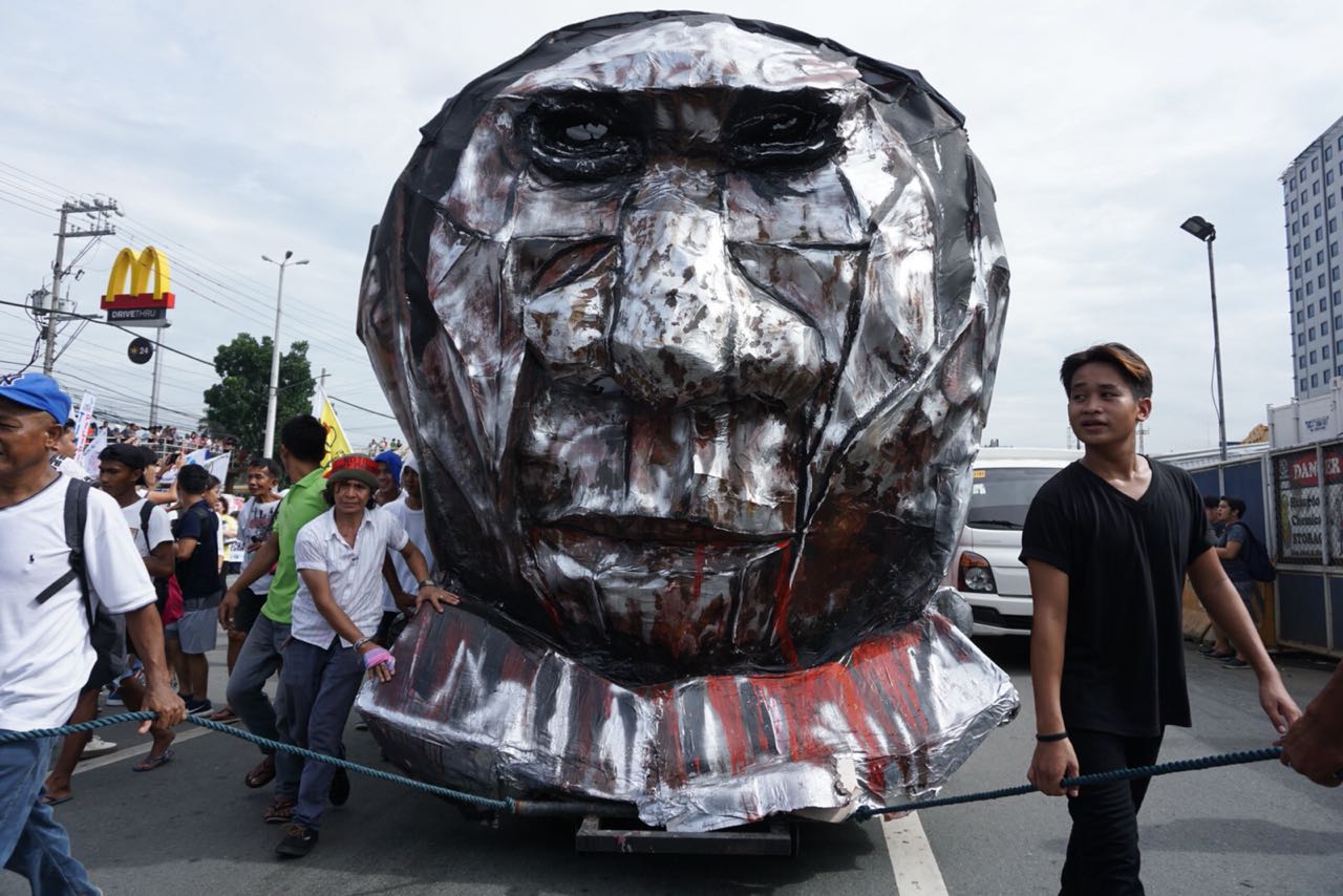 “DuterTrain,” a train-inspired effigy depicting the controversial tax reform law is the centerpiece of this year’s Sona protest. Photo from Jhoanna Ballaran