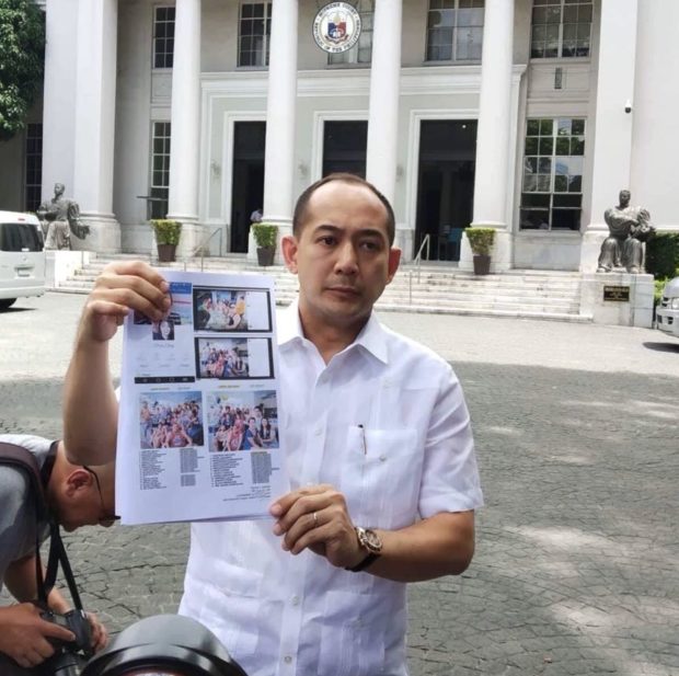 Bongbong Marcos' spokesperson Atty. Vic Rodriguez showing to the media photos of the alleged outing which was attached to the pleading the filed before PET. TETCH TORRES-TUPAS/INQUIRER.net