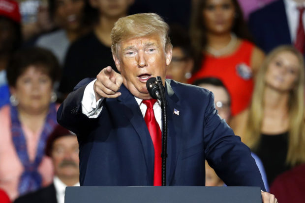 President Donald Trump speaks during a rally, Saturday, Aug. 4, 2018, in Lewis Center, Ohio. (AP Photo/John Minchillo)