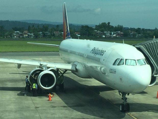 The stalled Philippine Airlines aircraft PR-2814 at the F. Bangoy International Airport in Davao City following an apparent birdstrike on one of its engines on Wednesday, Aug. 28, 2018. (Photo by Christine Dompor)