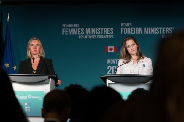 Canadian Foreign Minister Chrystia Freeland (R) and European Union Foreign Policy Chief Federica Mogherini speak to the press during the Women Foreign Ministers' Meeting in Montreal, Canada, on September 22, 2018.     Women foreign ministers from around the world kicked off a first-of-its-kind meeting on Friday, bringing together more than half of the world's top women diplomats in Montreal.    / AFP PHOTO / MARTIN OUELLET-DIOTTE