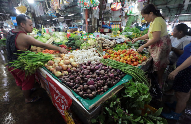 Vegetables and other goods in a market. STORY: Palace vows to address rising prices