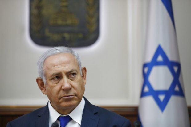 Israelis vote in election focused on longtime PM Netanyahu