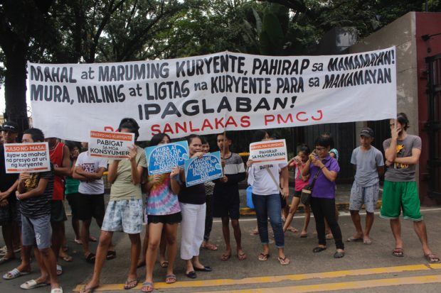 LOOK: Groups protest outside House, call for renewable energy