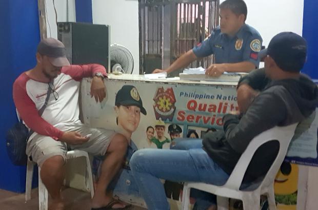 Two suspects at the Sipalay City Police Station