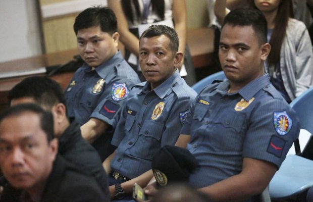 Jerry Cruz, policeman Arz Oares and policeman Jeremias Pereda, accused of killing Kian delos Santos, surrendered to the Justice Department for preliminary investigation on September 14, 2017. The Regional Trial of the City of Caloocan The court is expected to announce its decision on Thursday.