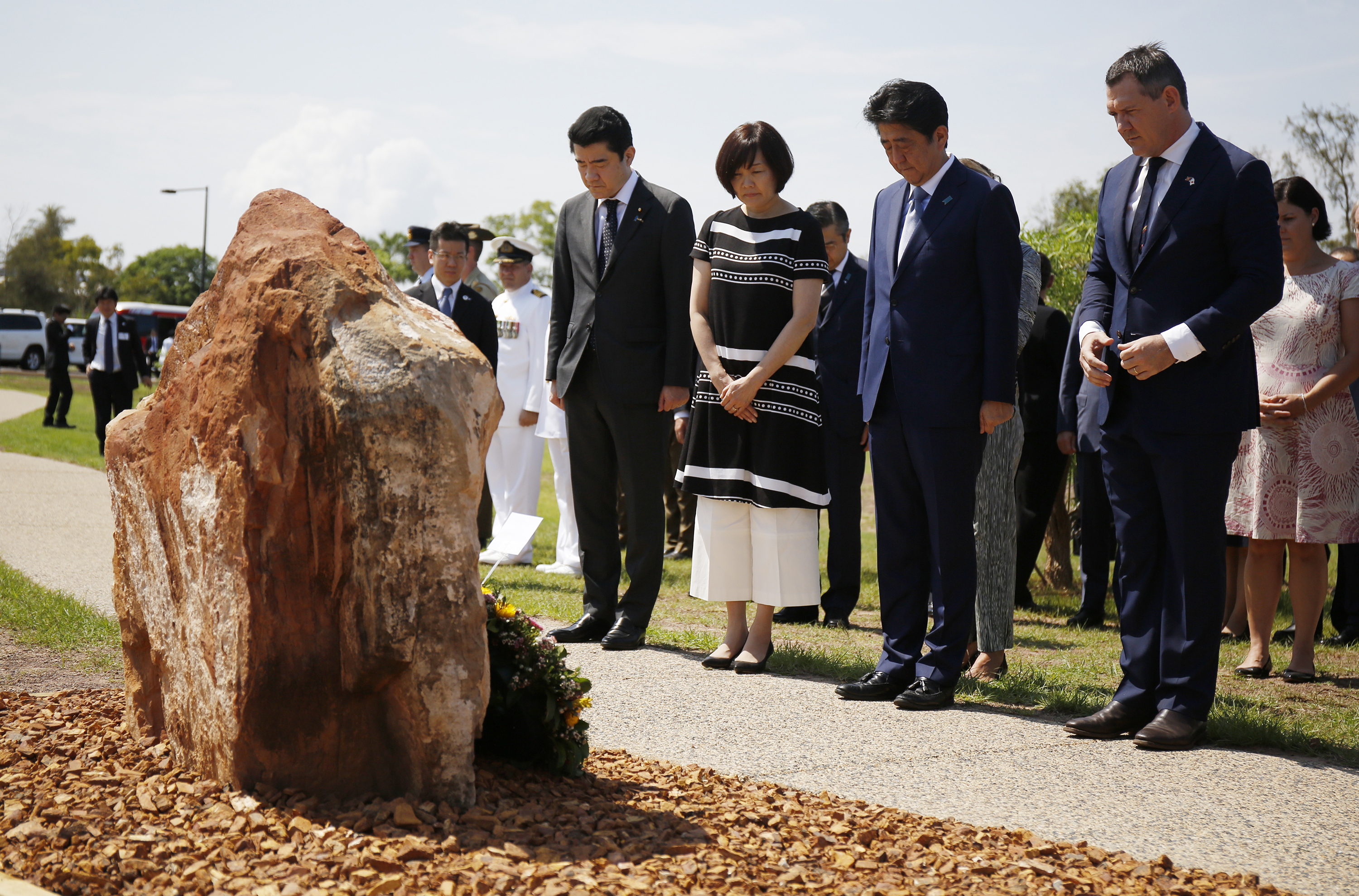 Abe visits Darwin shrine to Japanese war dead
