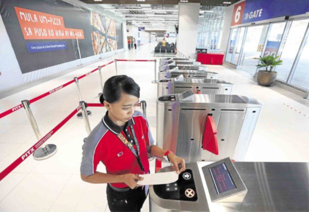 Ticketing counters, boarding gates and separate arrival and departure areas are some of the features of the Parañaque Integrated Terminal Exchange which opened on Monday. —MARIANNE BERMUDEZ  Read more: https://newsinfo.inquirer.net/1050740/first-ph-landport-promises-to-help-ease-metro-manila-traffic#ixzz5Wc0vqdgF  Follow us: @inquirerdotnet on Twitter | inquirerdotnet on Facebook  Parañaque Integrated Terminal Exchange