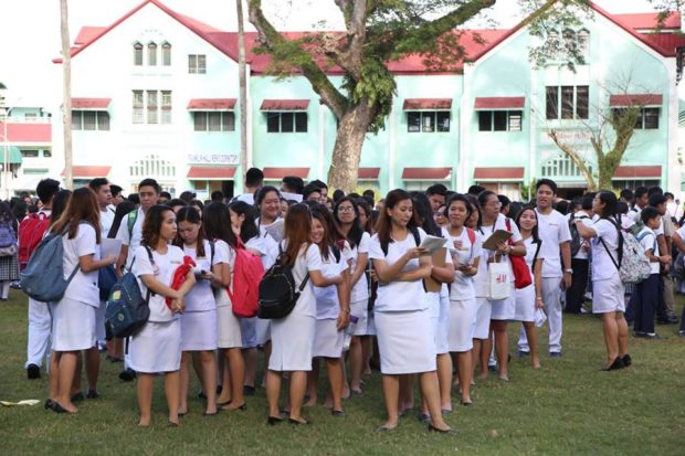College students of the Central Philippine University (CPU) in Jaro, Iloilo City wait at their football field during the first earthquake of intensity 4.7 that struck at 7:45 a.m. with epicenter at San Jose de Buenavista in Antique. A second stronger earthquake at intensity 4.8 happened at 10:54 a.m. with Guimbal, Iloilo as epicenter. Photo credits: CPU Educational Media Center (EMC)