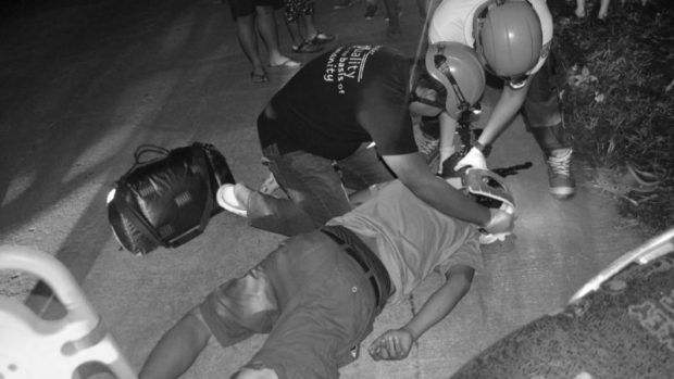 Rescuers from Sariaya disaster risk reduction and management office (DRRMO) apply first aid on a motorcycle rider whose vehicle collided with a tricycle in Quezon province. The victim Rogelio Magadia, however, died while being taken to the hospital. Photo from Sariaya DRRMO