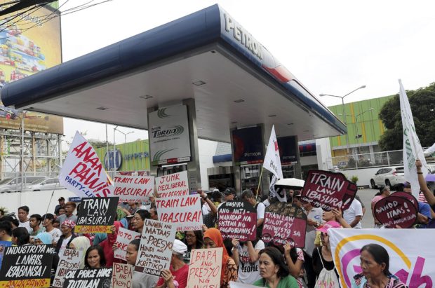 LOW REGARD FOR WORKERS’ Despite declining gas prices, labor groups say the government’s insistence on a second round of fuel tax shows its low regard for the welfare of the poor people affected by the tax policy. —GRIG C. MONTEGRANDE