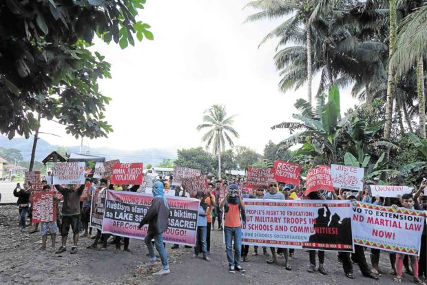 PROTEST In this photo taken last year, indigenous peoples groups and their supporters gather in front of the 27th Infantry Battalion headquarters in Tupi, South Cotabato, to protest against the killing of Datu Victor Danyan and six others. —BONG SARMIENTO