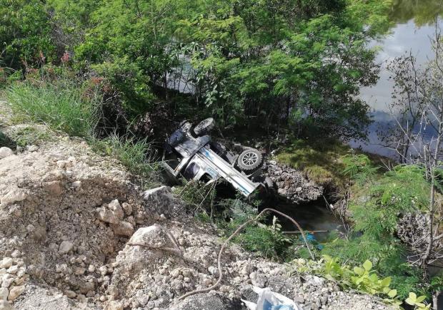 Multicab fallen down a cliff in Bohol