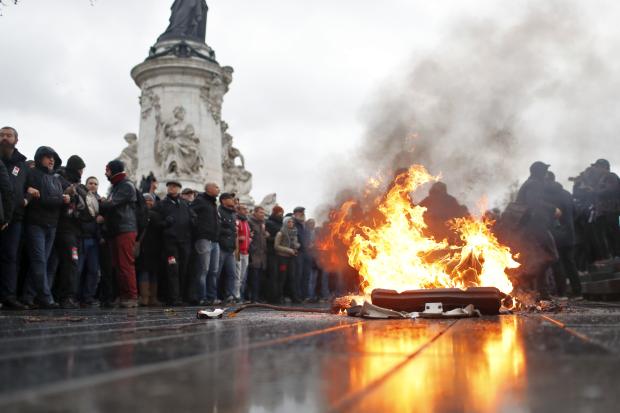 Burning bin during protest in Paris