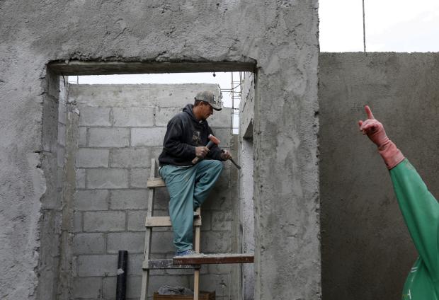 Honduran migrant working as construction worker