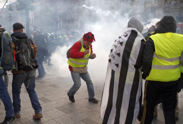 Tear gassed protesters in Paris